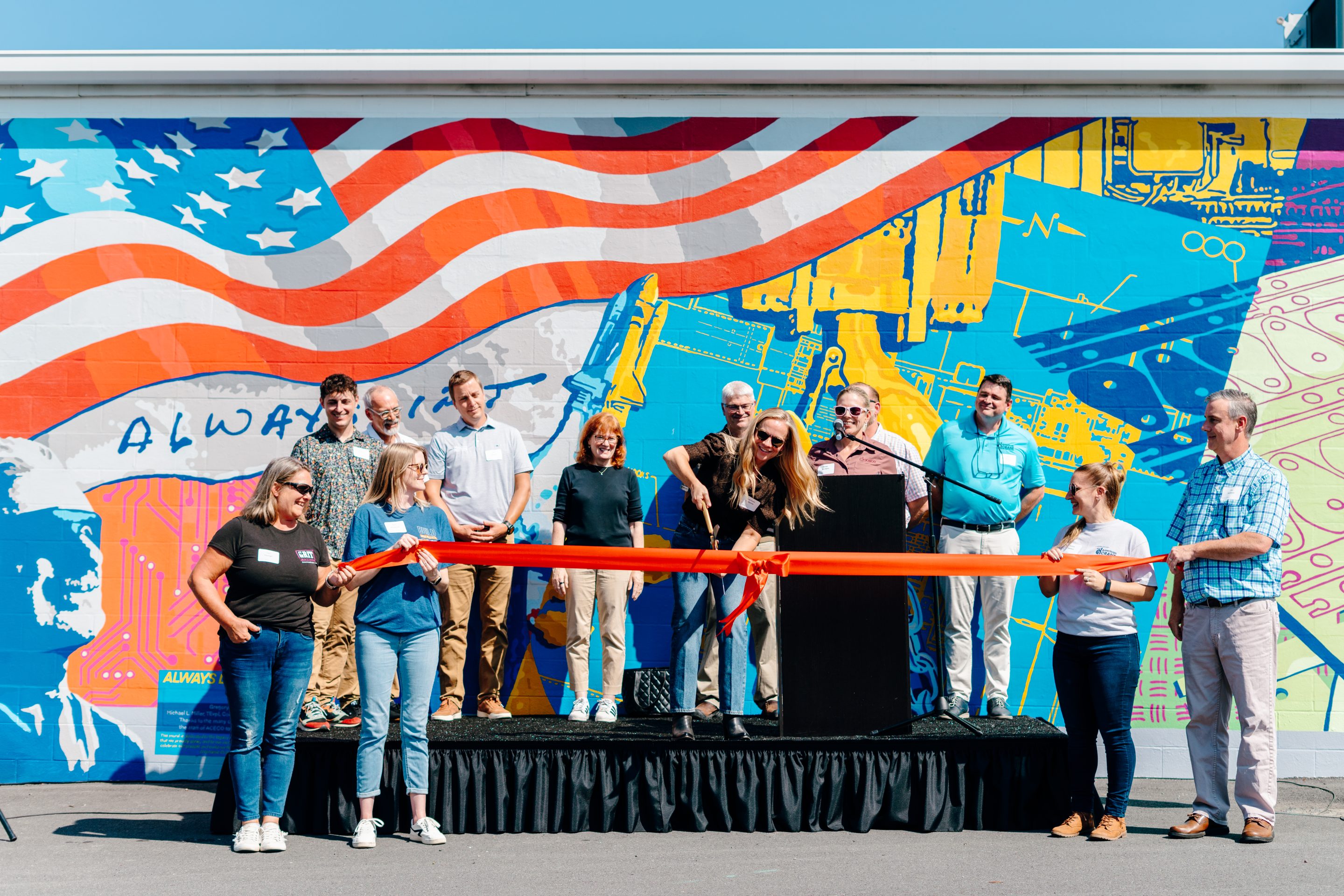 American Crane Dedicates New Mural with Colorful Ribbon-Cutting Celebration