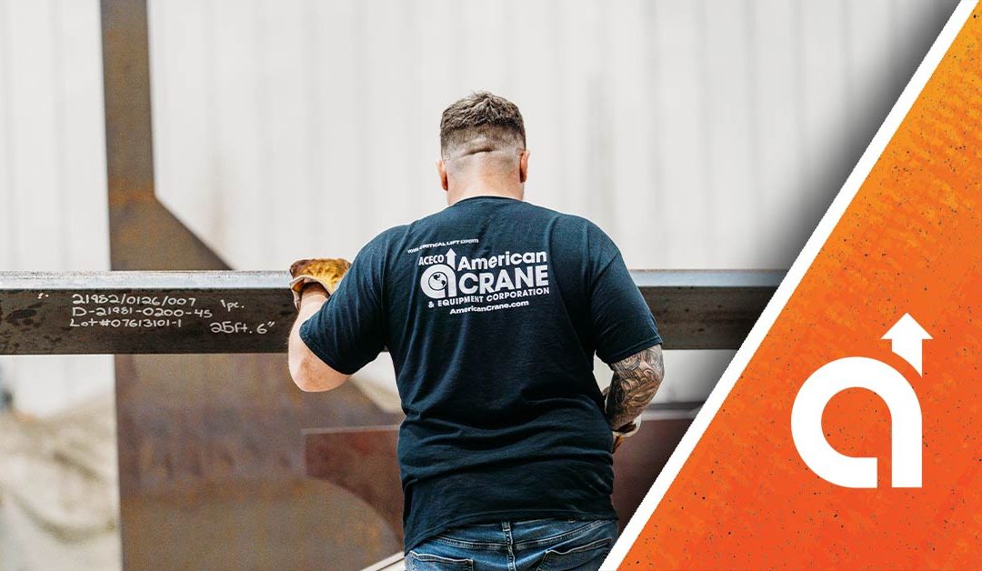 Overhead crane safety trends 2026 – technician inspecting an overhead crane hoist