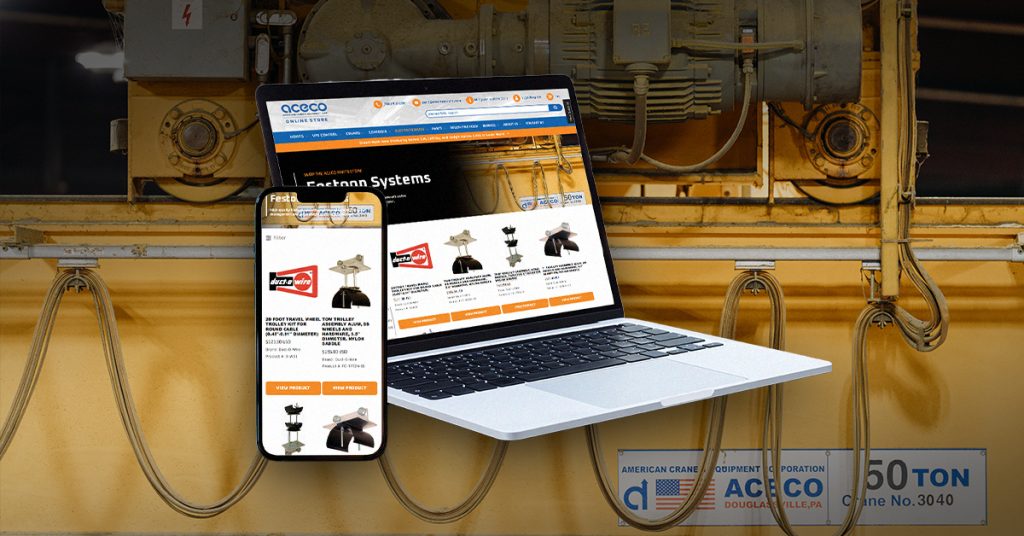 Hoist accessories from the ACECO online store shown on a laptop and phone, in front of a 50-ton overhead crane with festoon cables